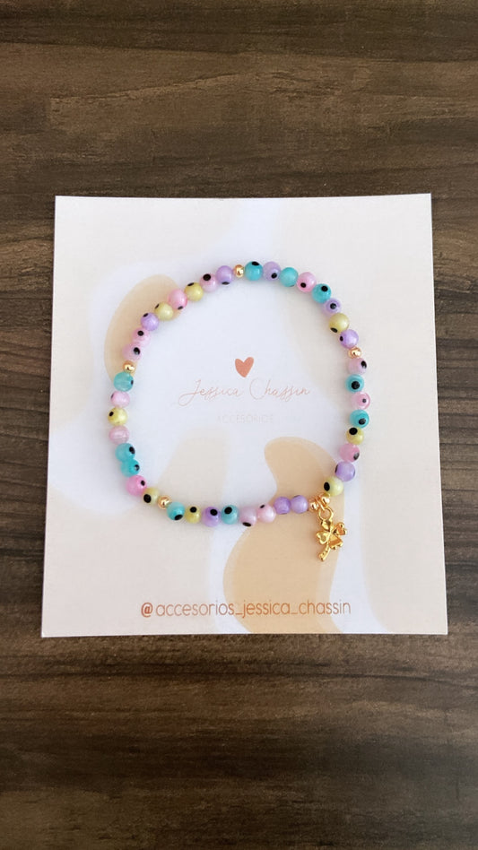 Pulsera ojitos pastel